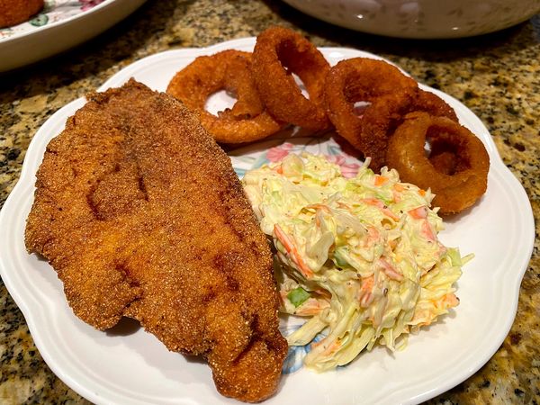 Crispy Fried Catfish Fillets with Coleslaw and Onion Rings