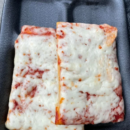 Square-cut pizza rectangles with biscuit-style crust and melted cheese.