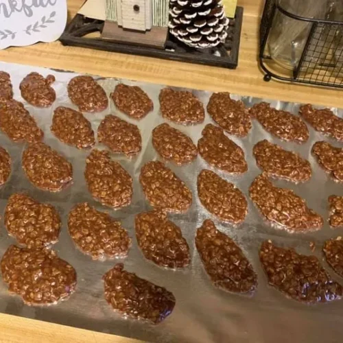 Old‑fashioned chocolate peanut butter oatmeal no‑bake cookies cooling on foil