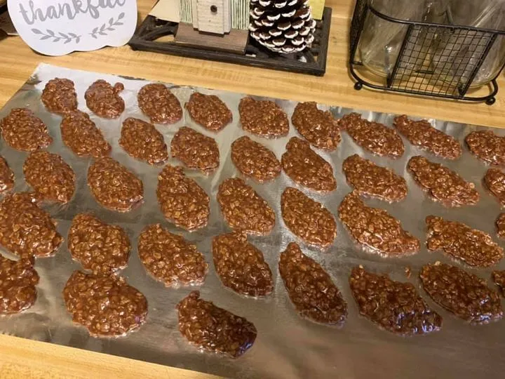 Old‑fashioned chocolate peanut butter oatmeal no‑bake cookies cooling on foil