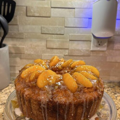 golden Hennessy peach cobbler pound cake with peach glaze
