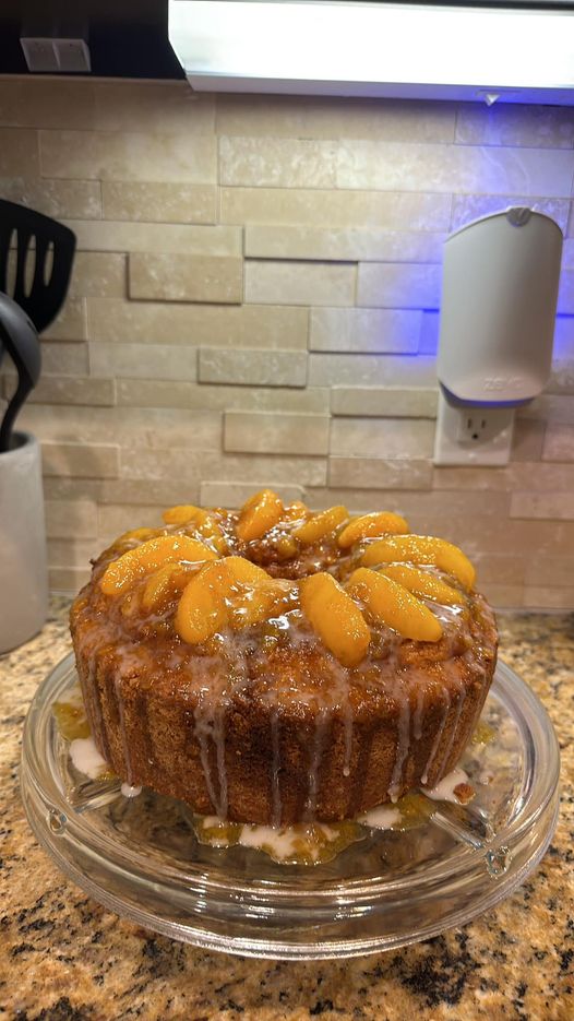 golden Hennessy peach cobbler pound cake with peach glaze