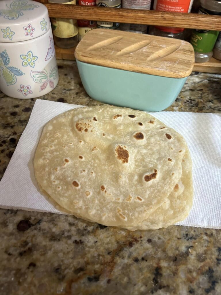 Stacked tortillas on a napkin