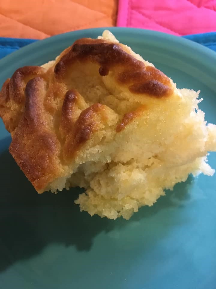 Fluffy, golden butter swim biscuits in a glass baking dish, side view showing buttery layers – southern butter swim biscuits