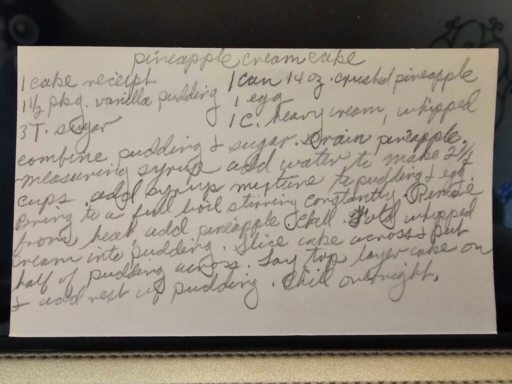 Vintage recipe box find: Pineapple Cream Cake recipe handwritten with layers of pudding, cream, and pineapple