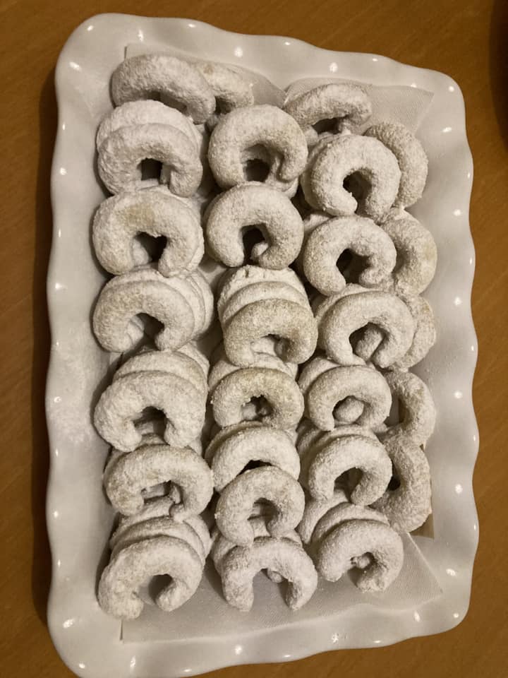 Vanillekipferl recipe with almond flour, butter, and powdered sugar for crescent-shaped cookies