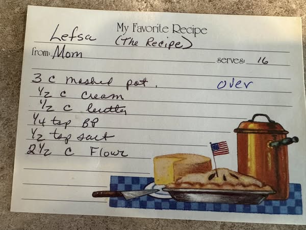 A handwritten list of ingredients for Grandma’s lefse recipe, featuring 10 pounds of potatoes, butter, and cream.