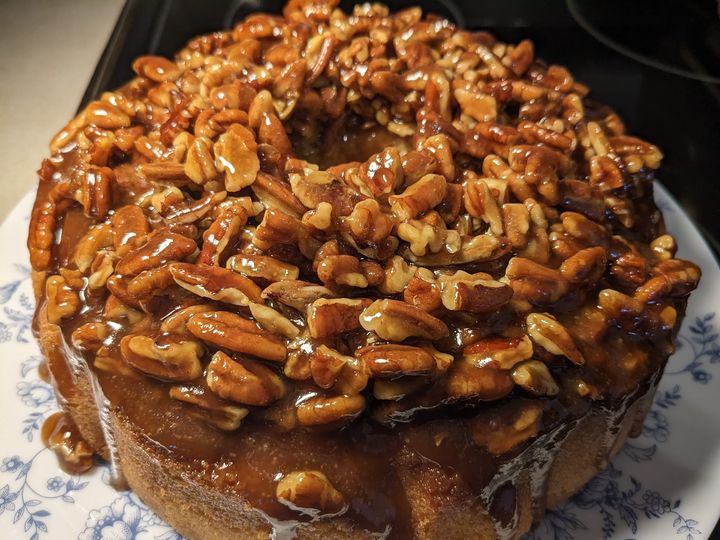 Upside down caramel pecan cake with a rich caramelized pecan topping, freshly baked and ready to serve