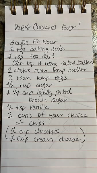 A handwritten list of ingredients for the best chocolate chip and cream cheese cookies.