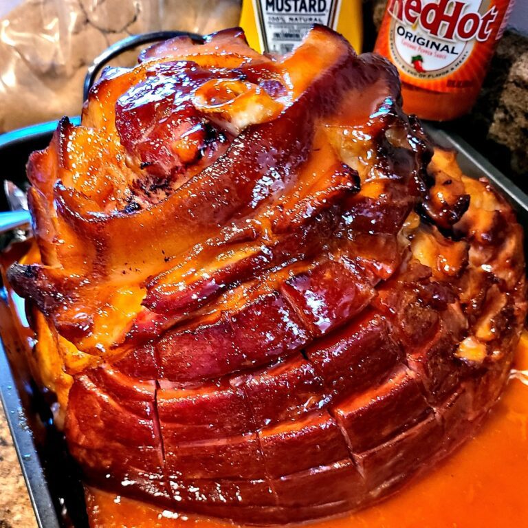 A beautifully glazed ham with a spicy-sweet caramelized crust, fresh from the oven