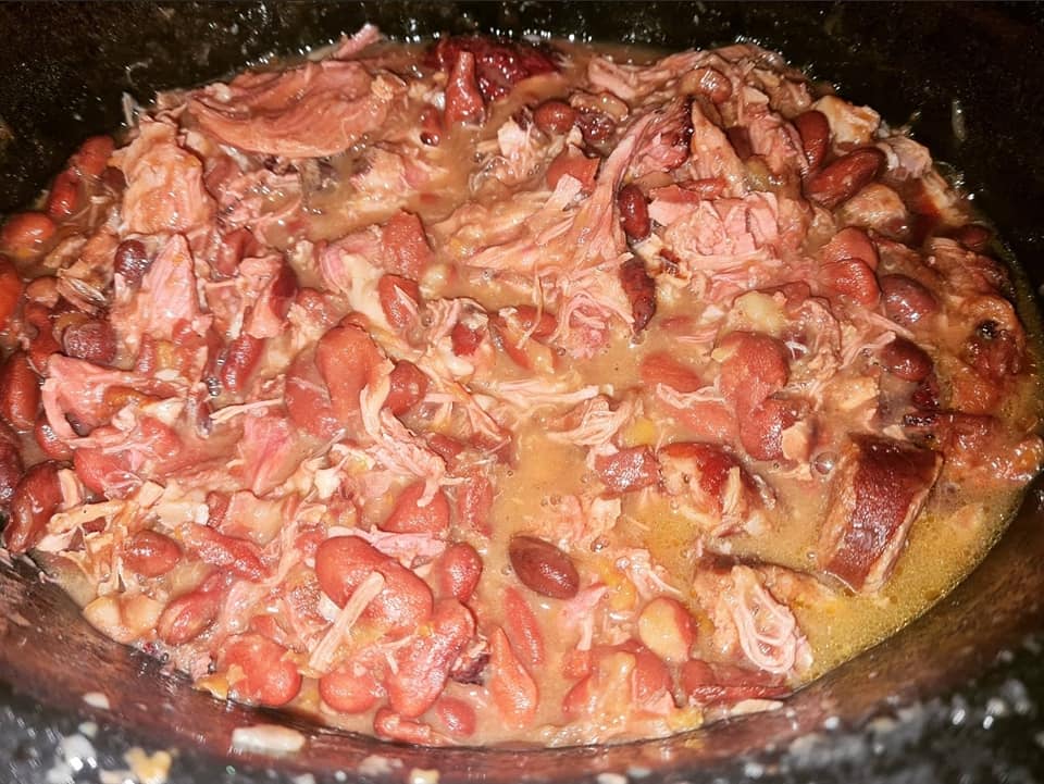 A hearty bowl of Crockpot Red Beans and Hamhock served with tender sausage and beans.