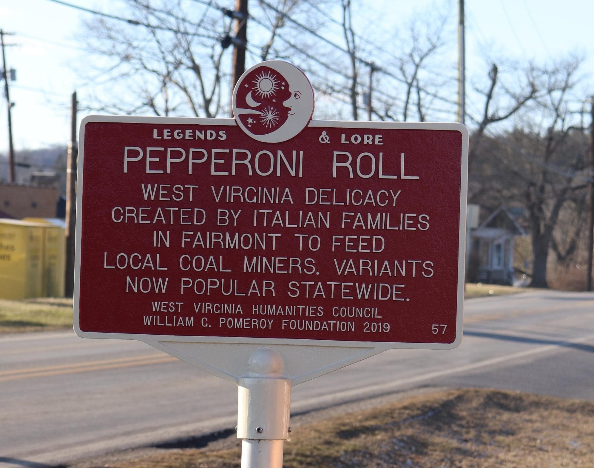 A historical marker in West Virginia commemorating the origin of the pepperoni roll, created by Italian families for coal miners