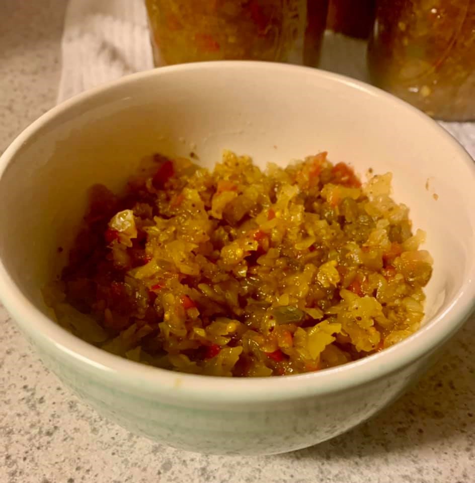 A small bowl of Southern chow chow, vibrant with peppers and cabbage, ready to serve