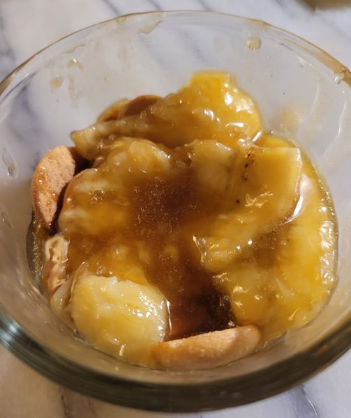 Soft, caramelized bananas coated in a luscious rum sauce, ready to be served.