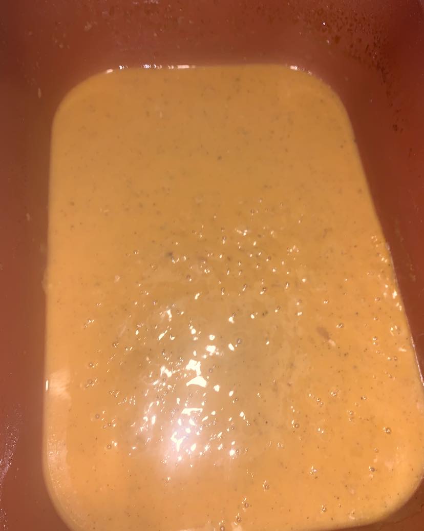 Onion roux bubbling in baking dish stove‑top