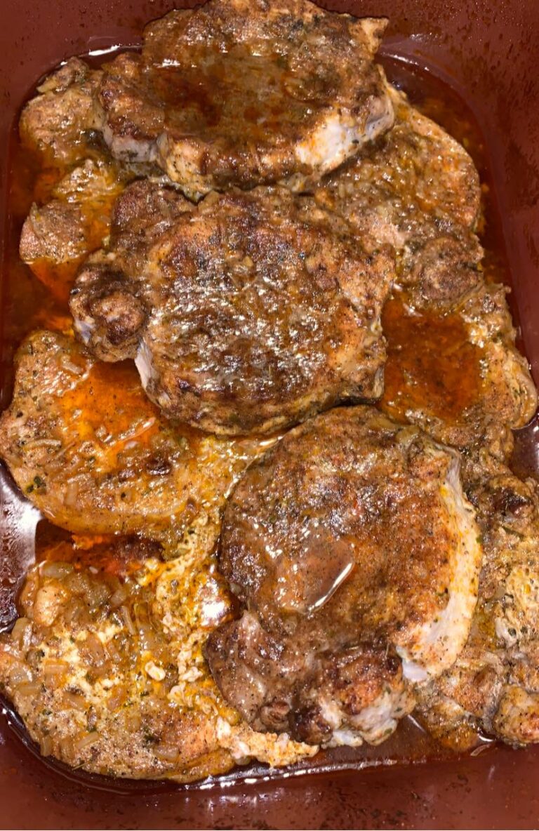 Pork chops covered in creamy pan gravy