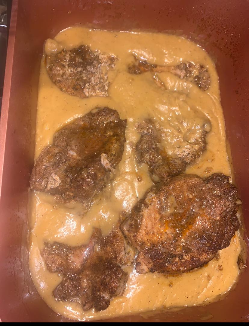 Baked pork chops with dark spice crust and pan drippings