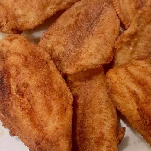Crispy southern fried catfish fillets fresh from skillet