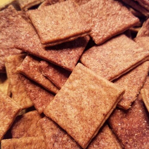 garlic herb sourdough discard crackers scored