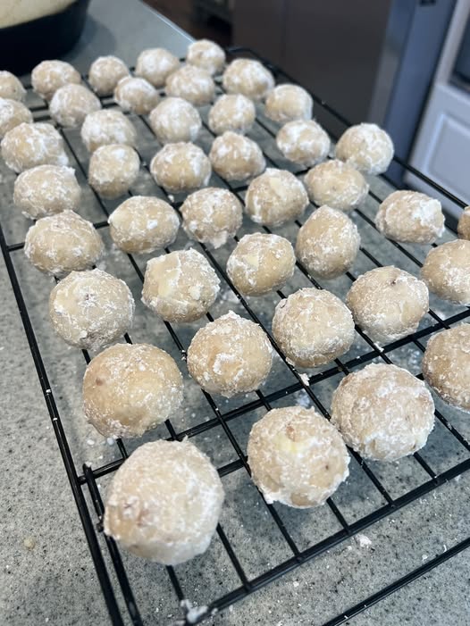 Crumbly inside of butter pecan snowball cookie