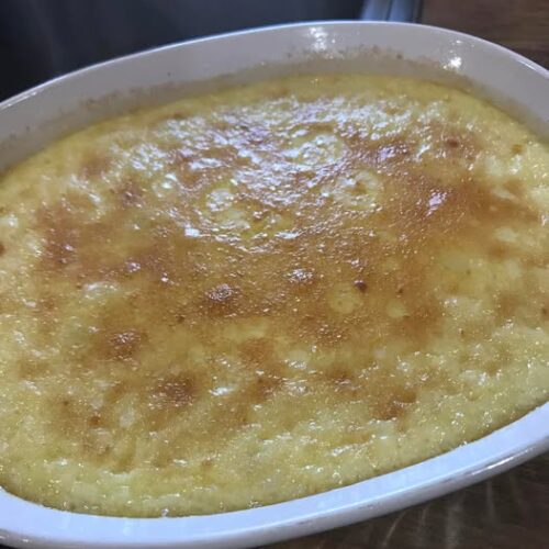 Bronzed top of old fashioned lemon rice pudding