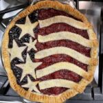 Pie decorated like U.S. flag ready for oven