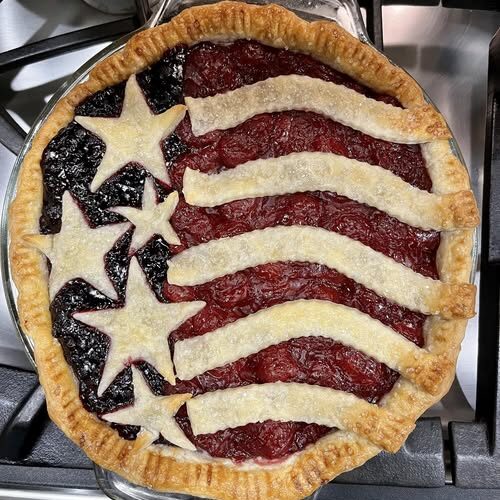 Pie decorated like U.S. flag ready for oven