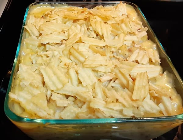 Potato chip topping browned on creamy tuna bake