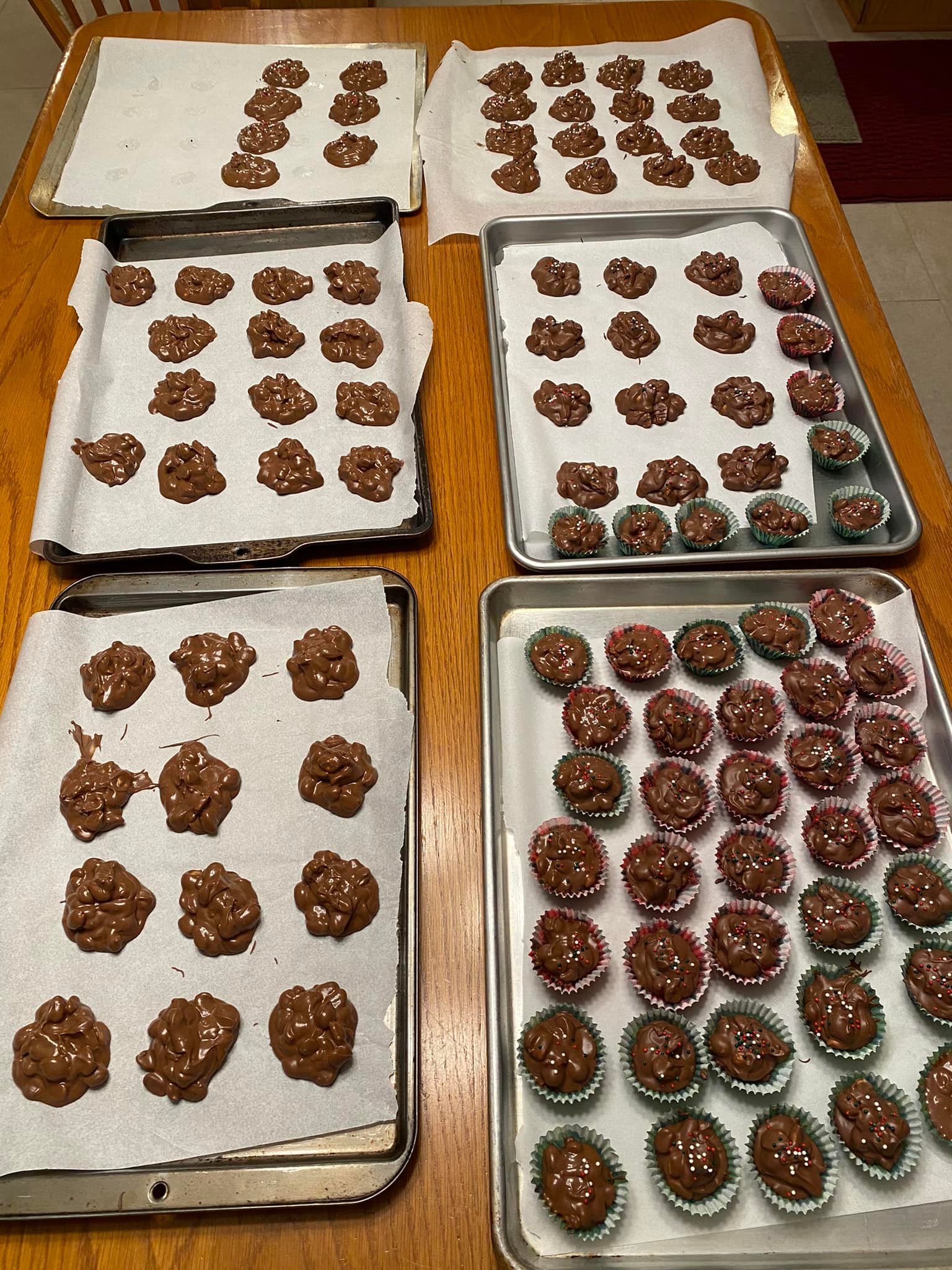 Crockpot Christmas crack candies topped with festive red, green, and white sprinkles