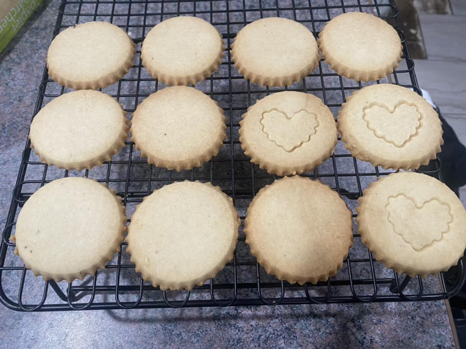 Golden traditional Scottish shortbread cookies cooling on wire rack
