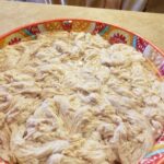 cleaned chitterlings in a colorful bowl soaking in water