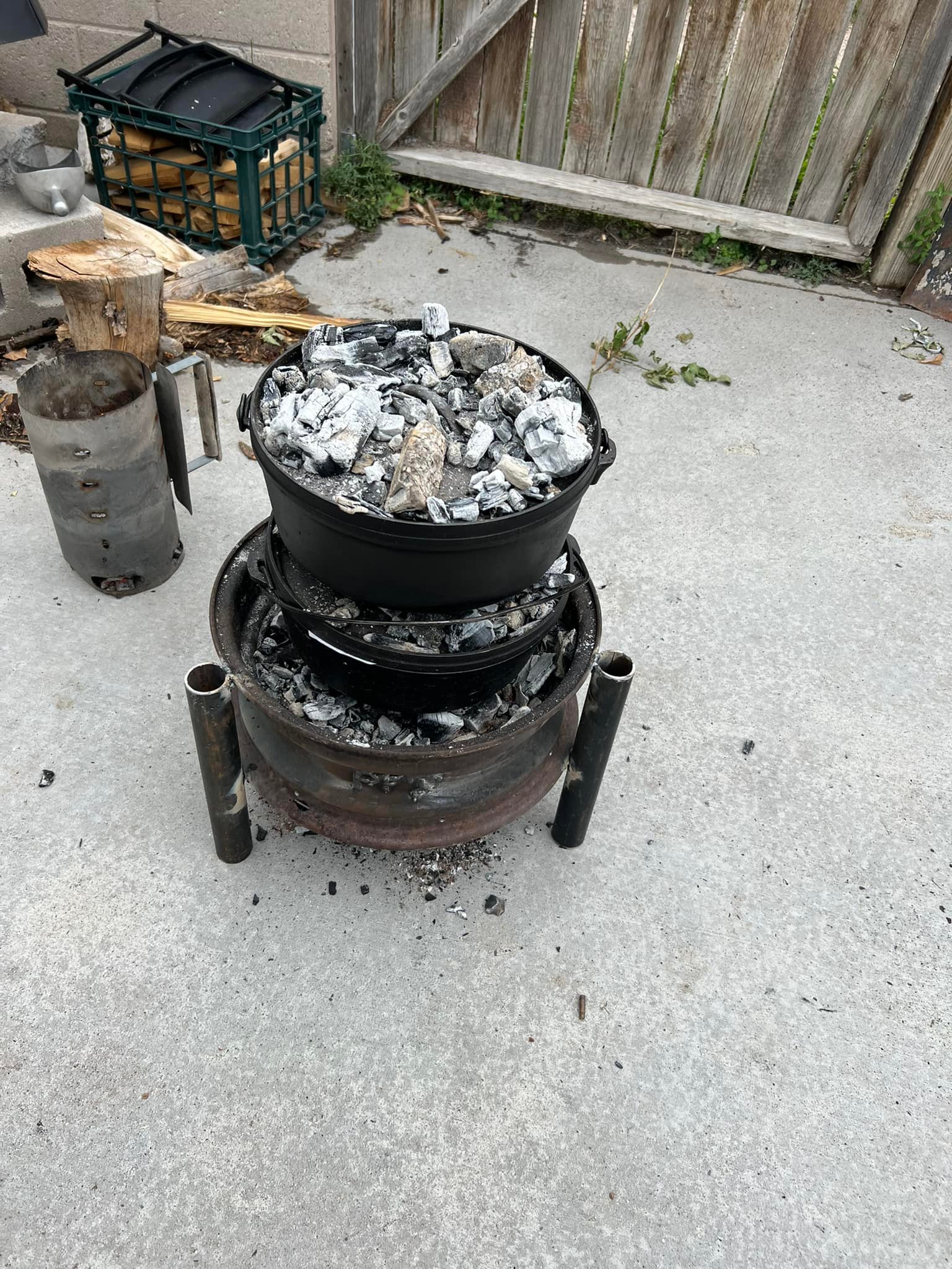 burnt Dutch oven peach cake showing overcooked top due to excessive coal heat
